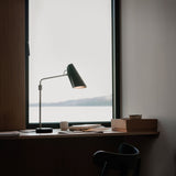 Birdy swing table lamp | black / brass