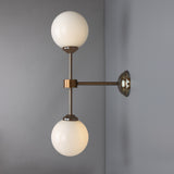 Yaounde double globe wall light | polished brass