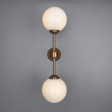 Yaounde double globe wall light | polished brass
