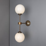 Yaounde double globe wall light | polished brass