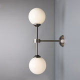 Yaounde double globe wall light | polished brass