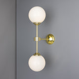 Yaounde double globe wall light | polished brass