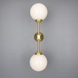 Yaounde double globe wall light | polished brass