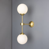 Yaounde double globe wall light | polished brass